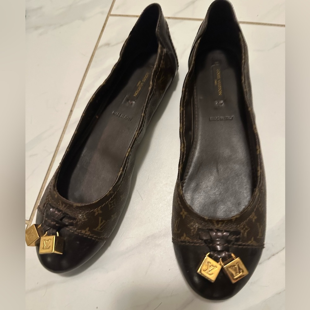 Louis Vuitton Brown Flats with Gold Accents